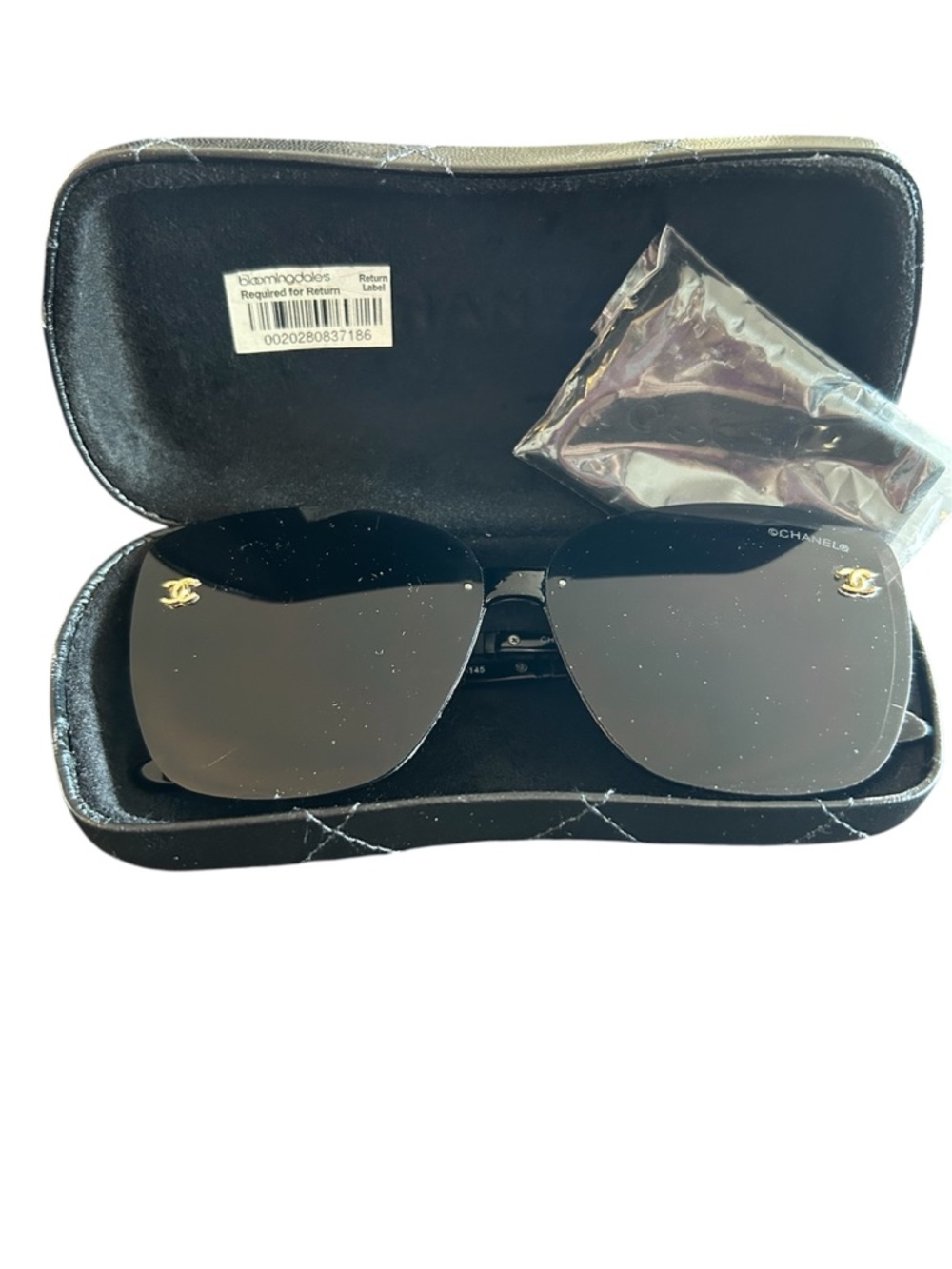 CHANEL Black Rimless Sunglasses with Gold CC Accents